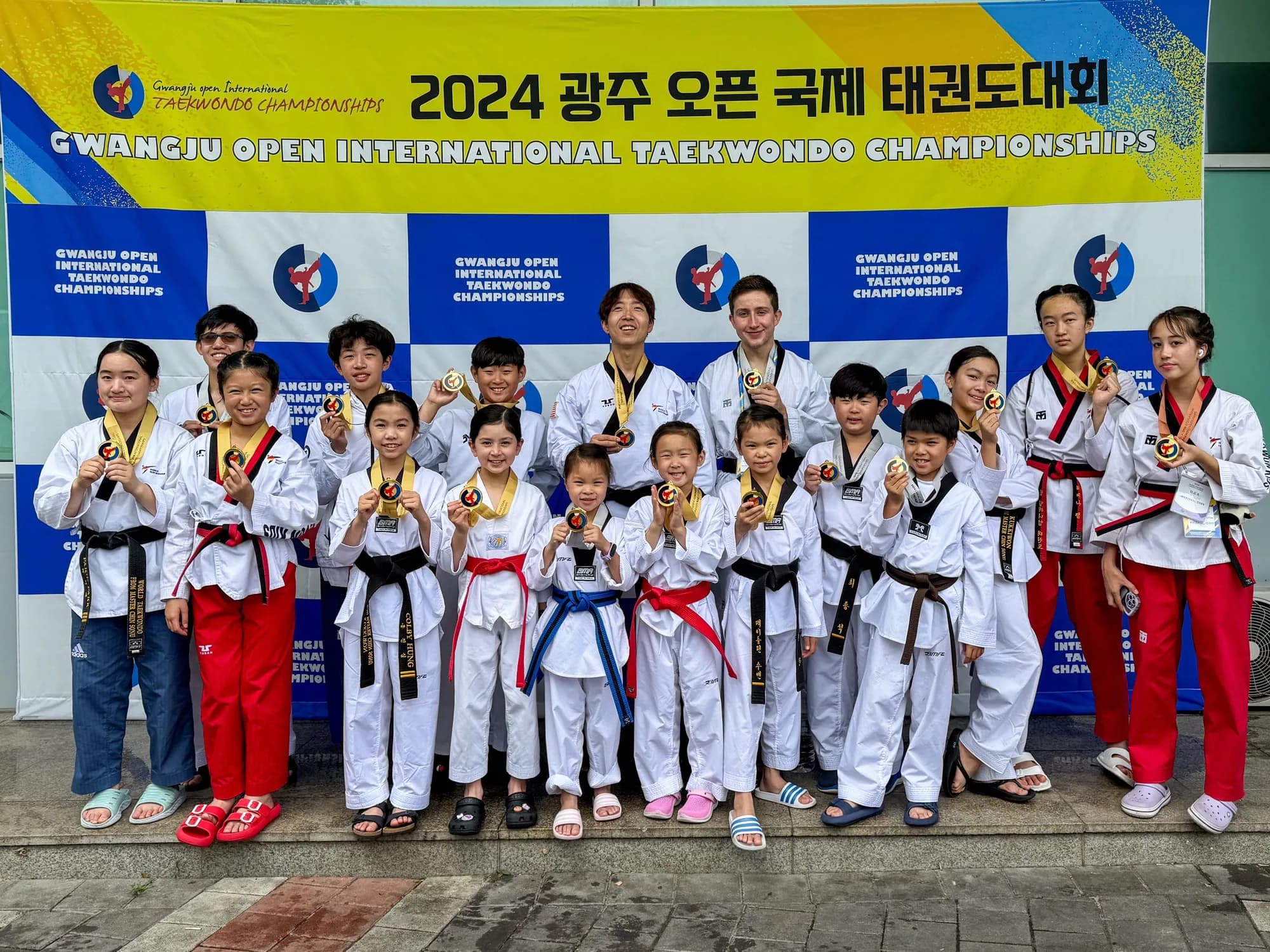 Master Lee's competition team at the 2024 Gwangju Open International Championships, Master Lee at center