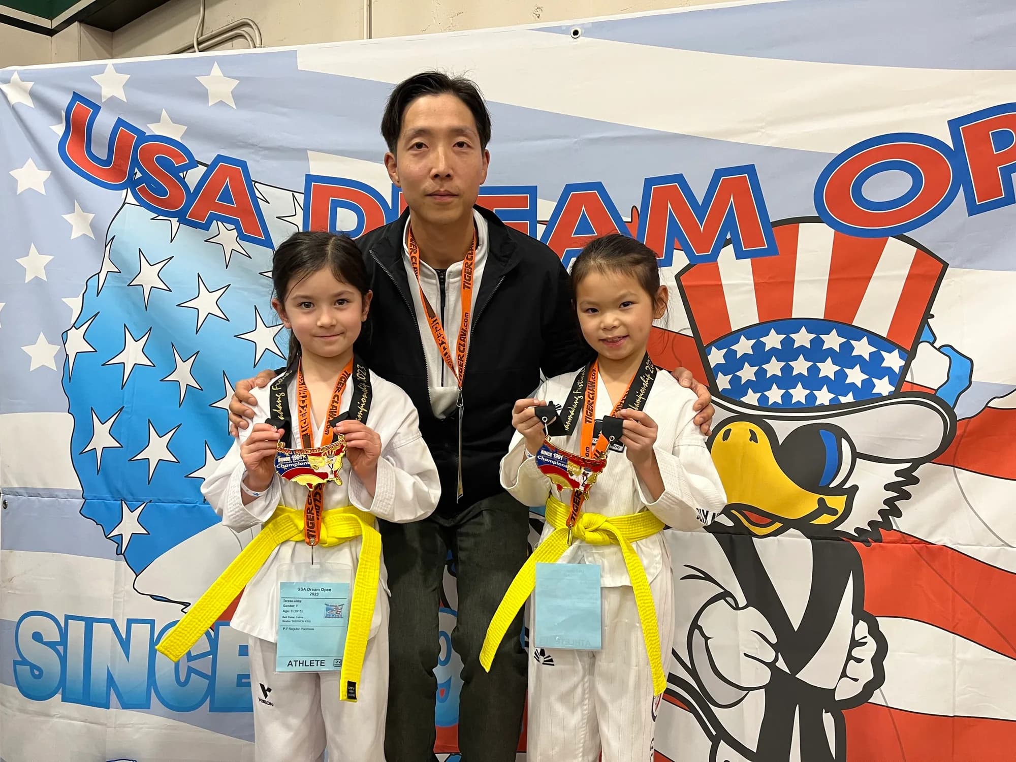 Two students from Master Lee's previous school with medals at the USA Dream Open
