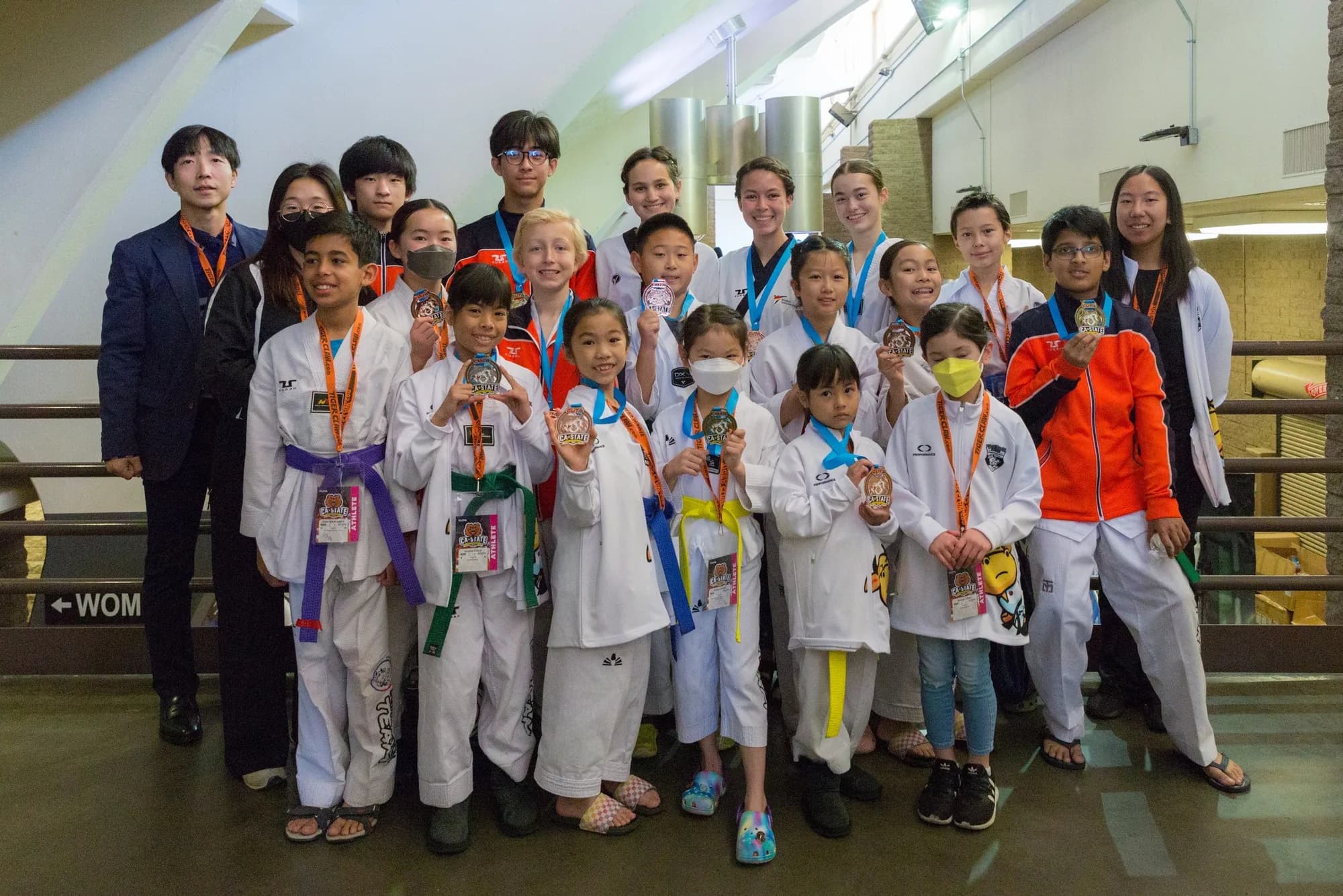 A large team from Master Lee's previous school holding California State medals